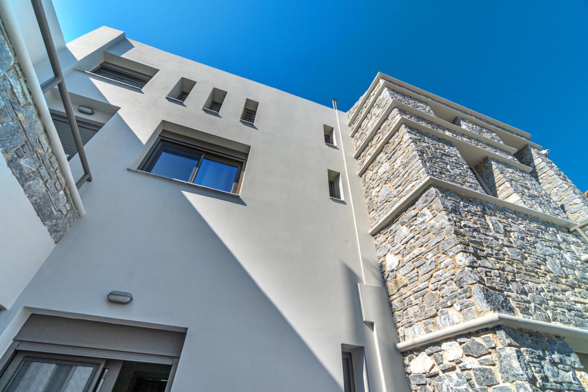 La Perla Suites Agii Apostoli Esterno foto